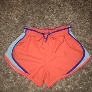 Nike dry-fit orange running shorts